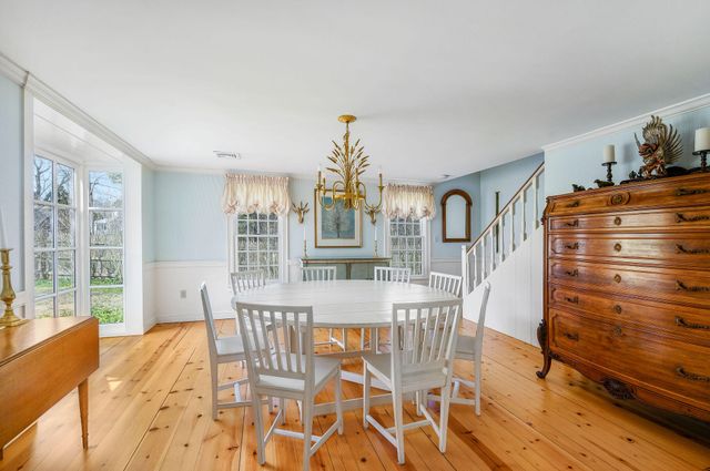 a spacious bedroom with a bed and a couch