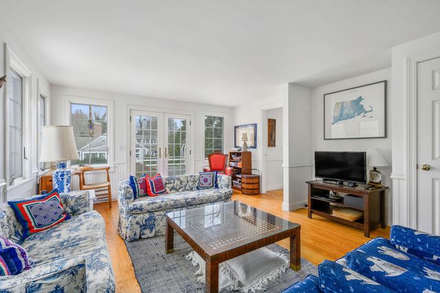 a kitchen with stainless steel appliances a stove a sink and a refrigerator