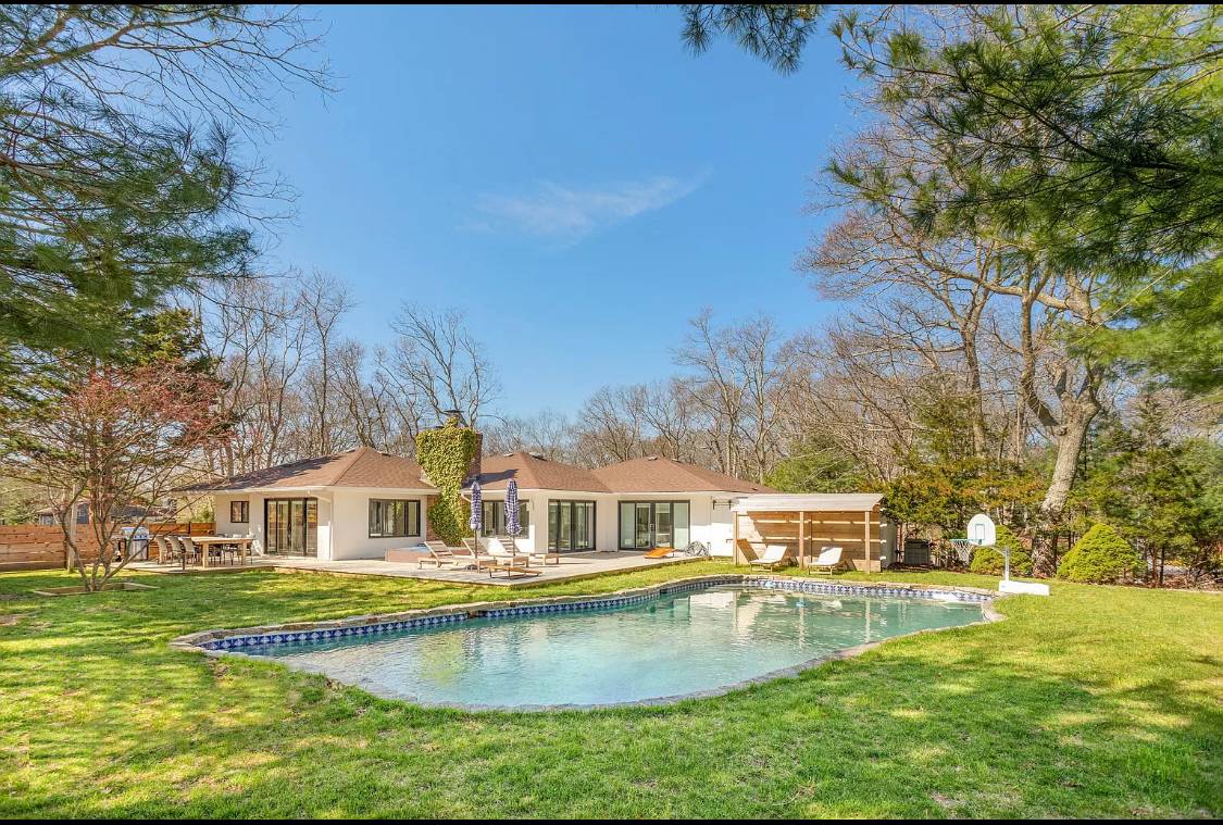 1 High Point Road East Hampton, NY 11937 - Photo 1 of 12 a front view of house with outdoor space and swimming pool