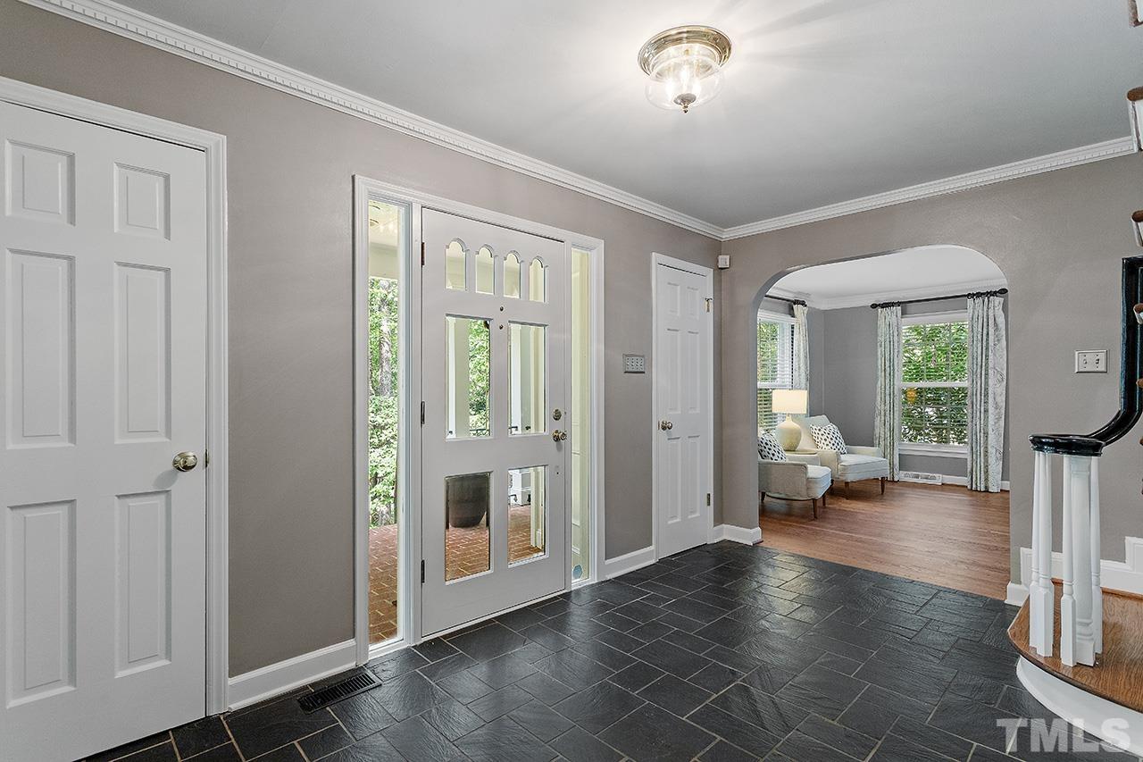 59 Kimberly Drive Durham, NC 27707 - Photo 15 of 68 a view of an empty room with glass door and glass door