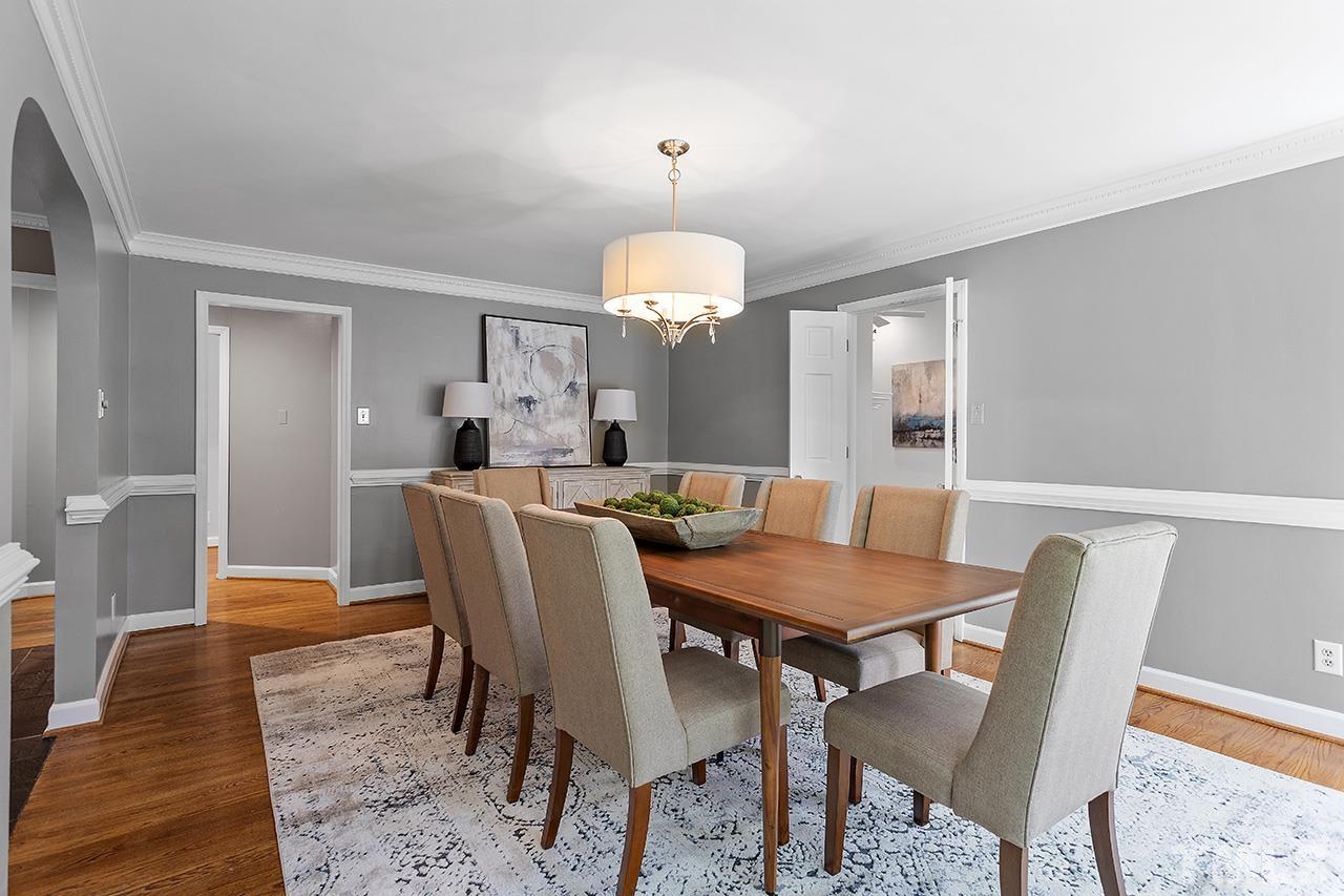 59 Kimberly Drive Durham, NC 27707 - Photo 18 of 68 a view of a a dining room with furniture window and wooden floor