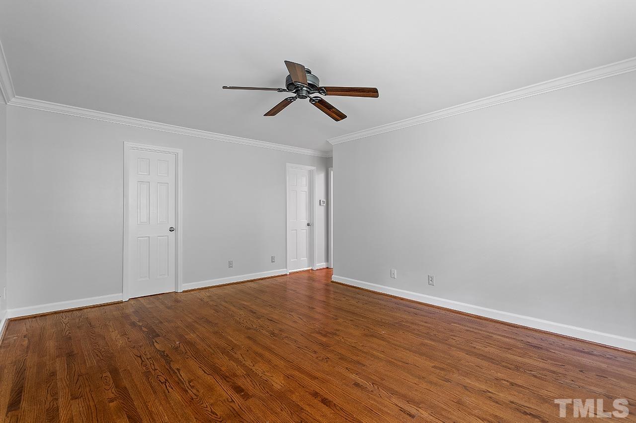 59 Kimberly Drive Durham, NC 27707 - Photo 31 of 68 a view of empty room with wooden floor