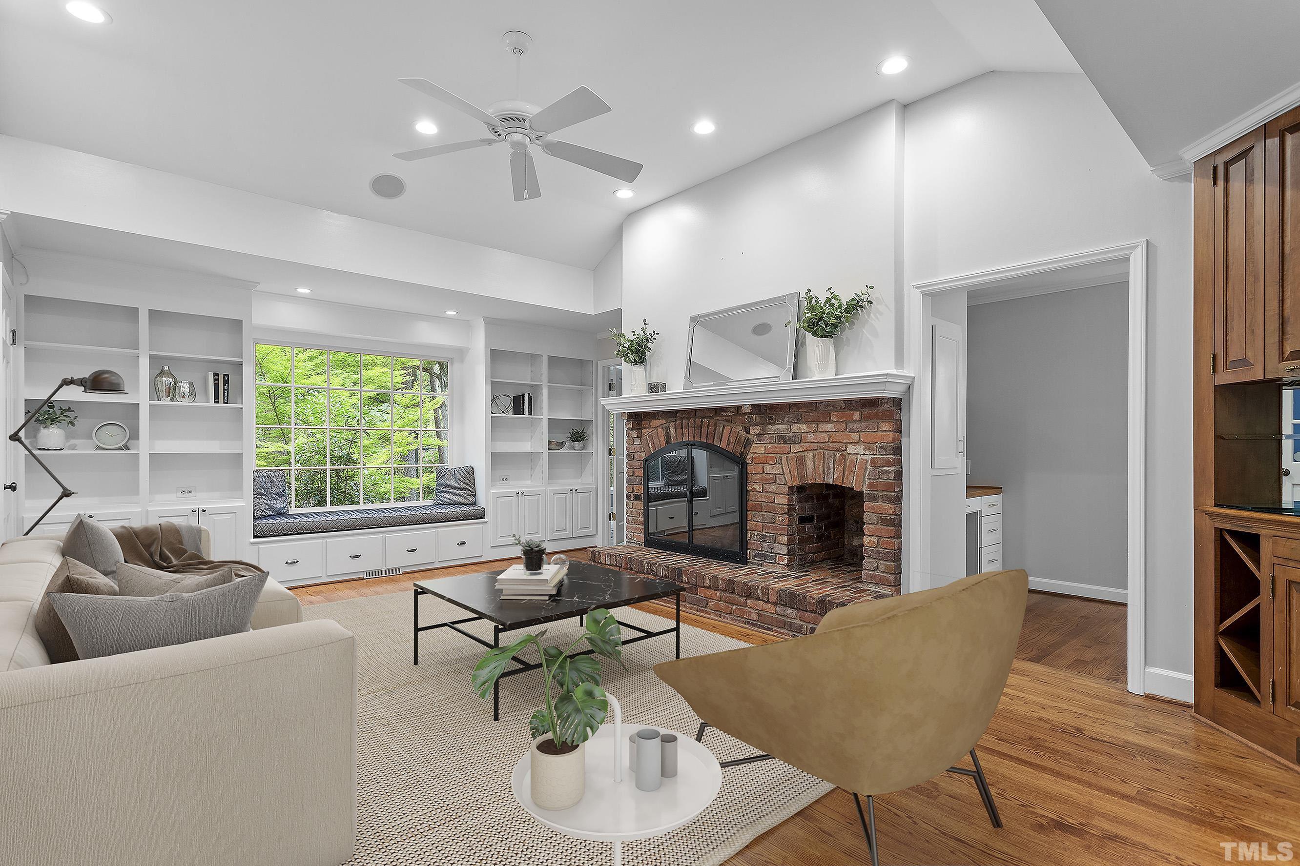59 Kimberly Drive Durham, NC 27707 - Photo 41 of 68 a living room with furniture and a fireplace