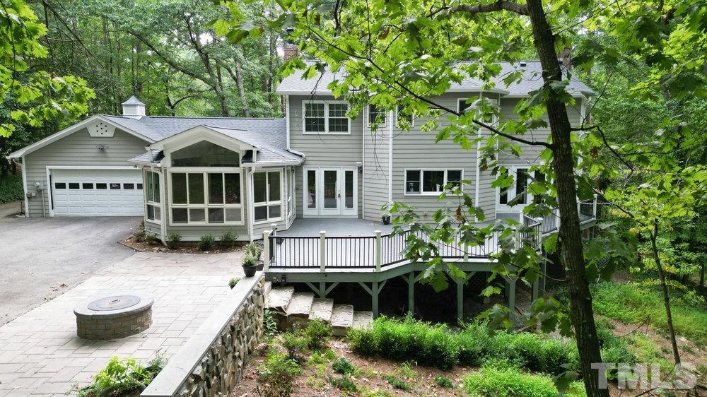 59 Kimberly Drive Durham, NC 27707 - Photo 56 of 68 a front view of a house with porch and garden