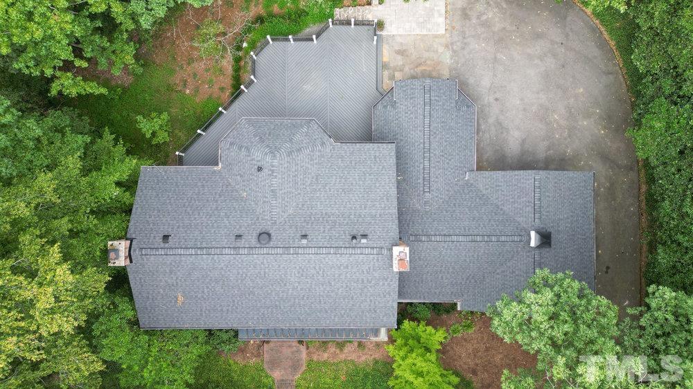 59 Kimberly Drive Durham, NC 27707 - Photo 59 of 68 an aerial view of a house with a yard and a fountain