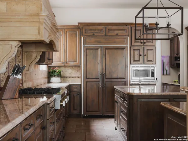 a kitchen with a cabinets and a stove