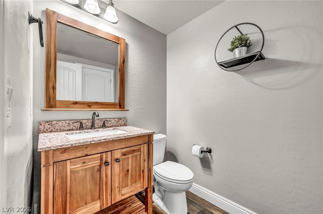 10982 Great Sioux Road Las Vegas, NV 89179 - Photo 23 of 49 Main level Half Bathroom with additional storage closet