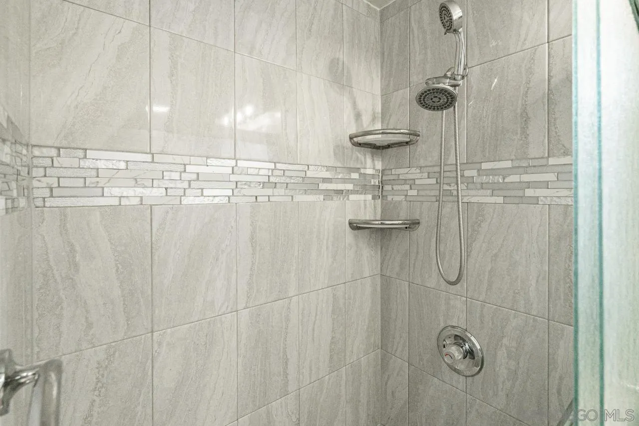 9026 Avocado Street Spring Valley, CA 91977 - Photo 20 of 27 a bathroom with a shower