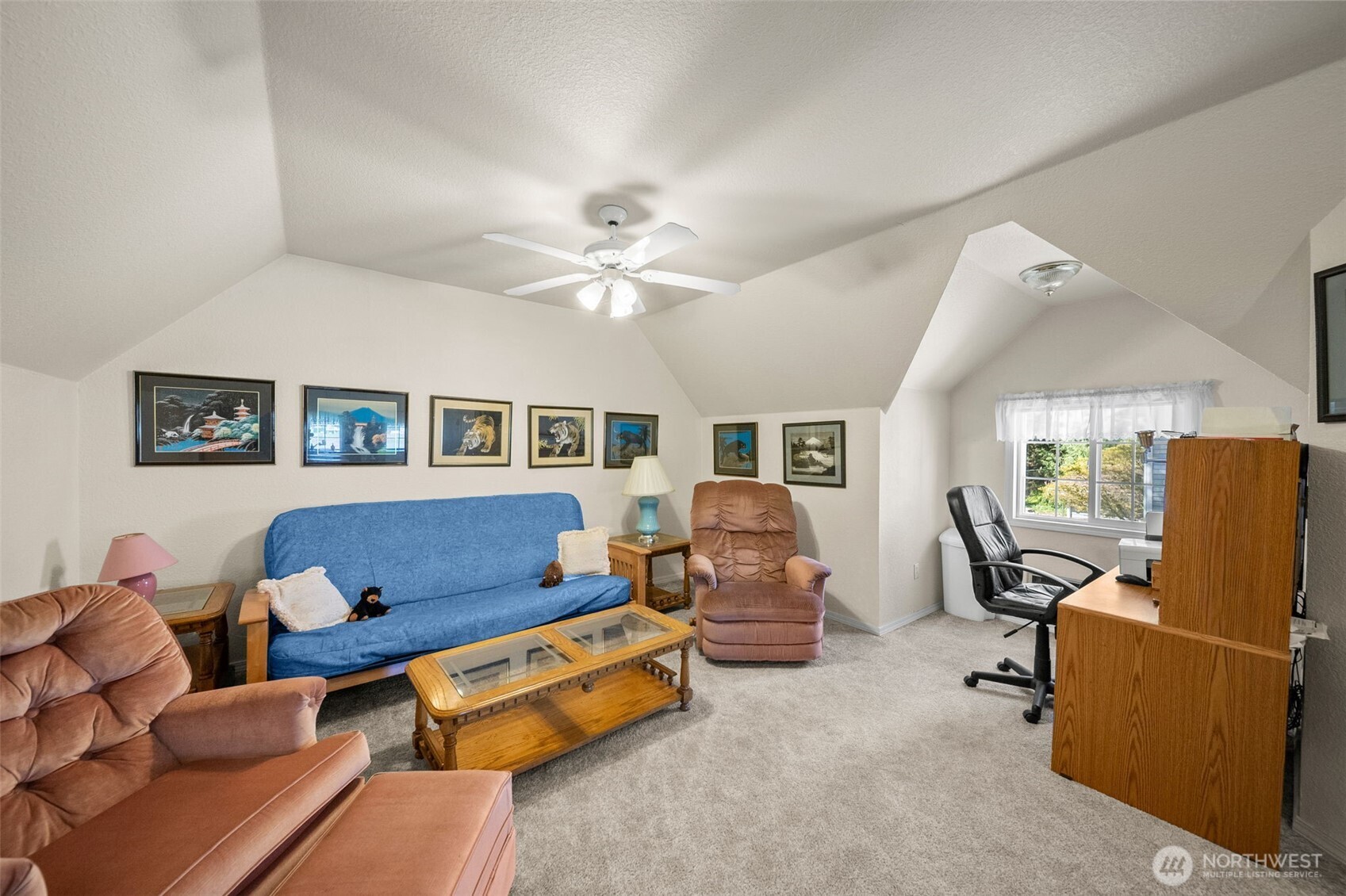 8320 East Grapeview Loop Road Allyn, WA 98524 - Photo 26 of 38 a living room with furniture and a flat screen tv