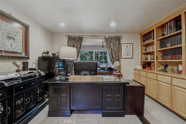 a view of a door with a ceiling fan