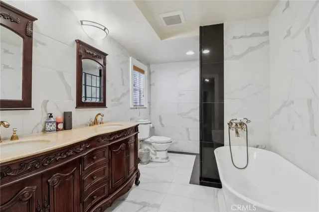 a living room with furniture window and wooden floor