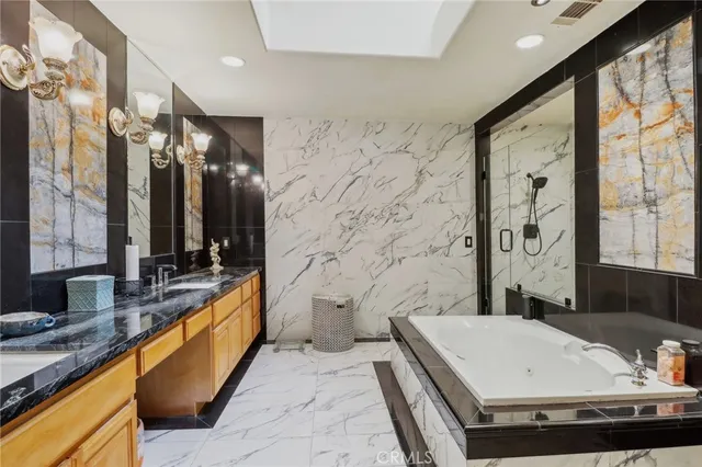 a view of living room filled with furniture and windows