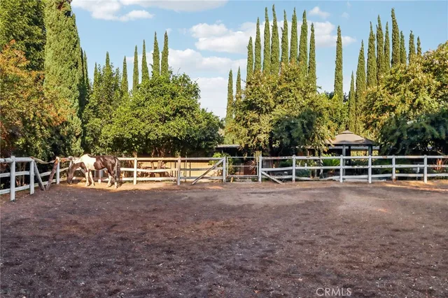 a view of a wrought iron fences in front of house