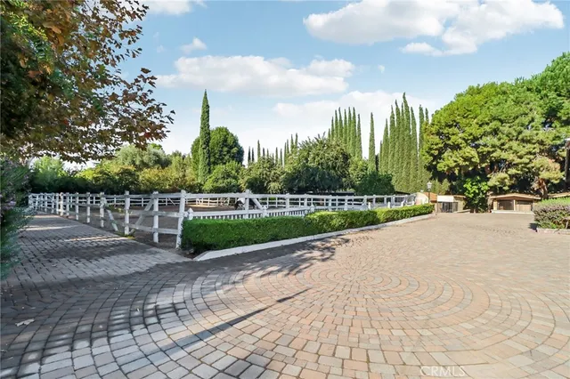 a view of a garden with patio