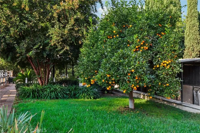an aerial view of a house with swimming pool