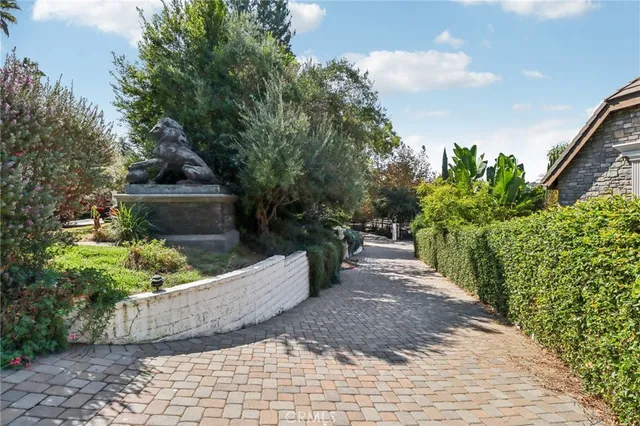 a front view of a house with yard