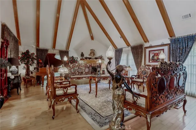 a living room with furniture or couch and a large window