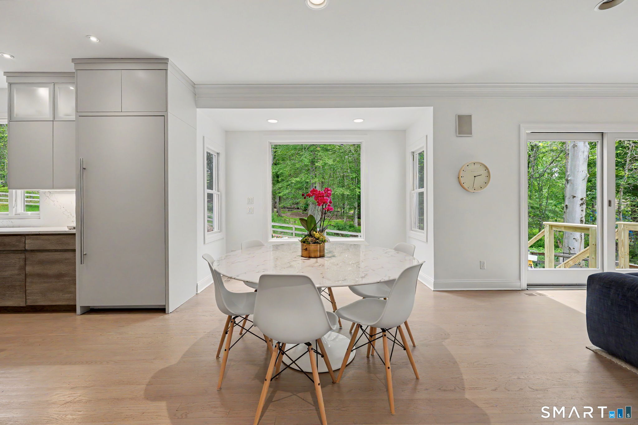 10 Side Hill Road Westport, CT 06880 - Photo 11 of 40 a view of a dining room with furniture window and outside view