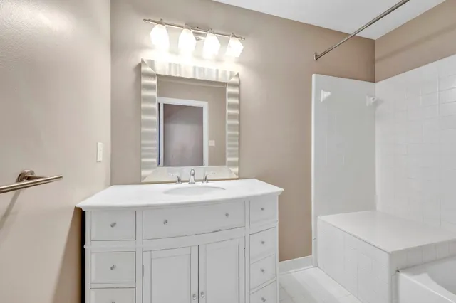 a view of a backyard with pathway