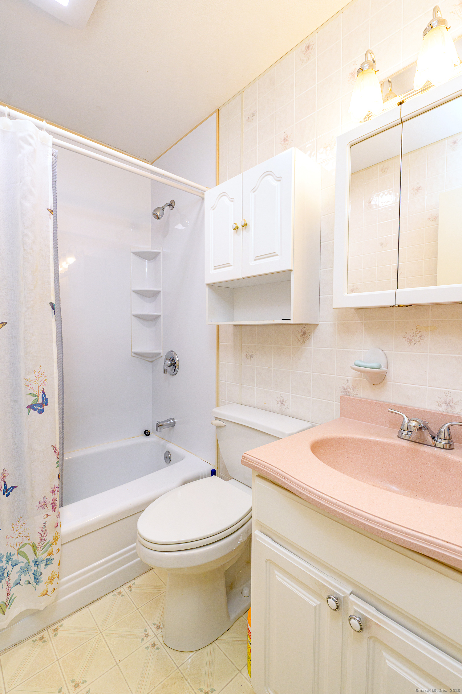 38 Toper Road Plainfield, CT 06374 - Photo 17 of 35 a bathroom with a sink a toilet and shower