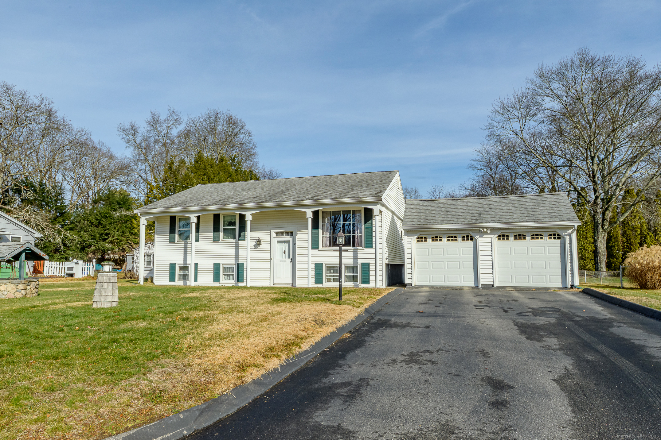 38 Toper Road Plainfield, CT 06374 - Photo 2 of 35 a front view of a house with a yard