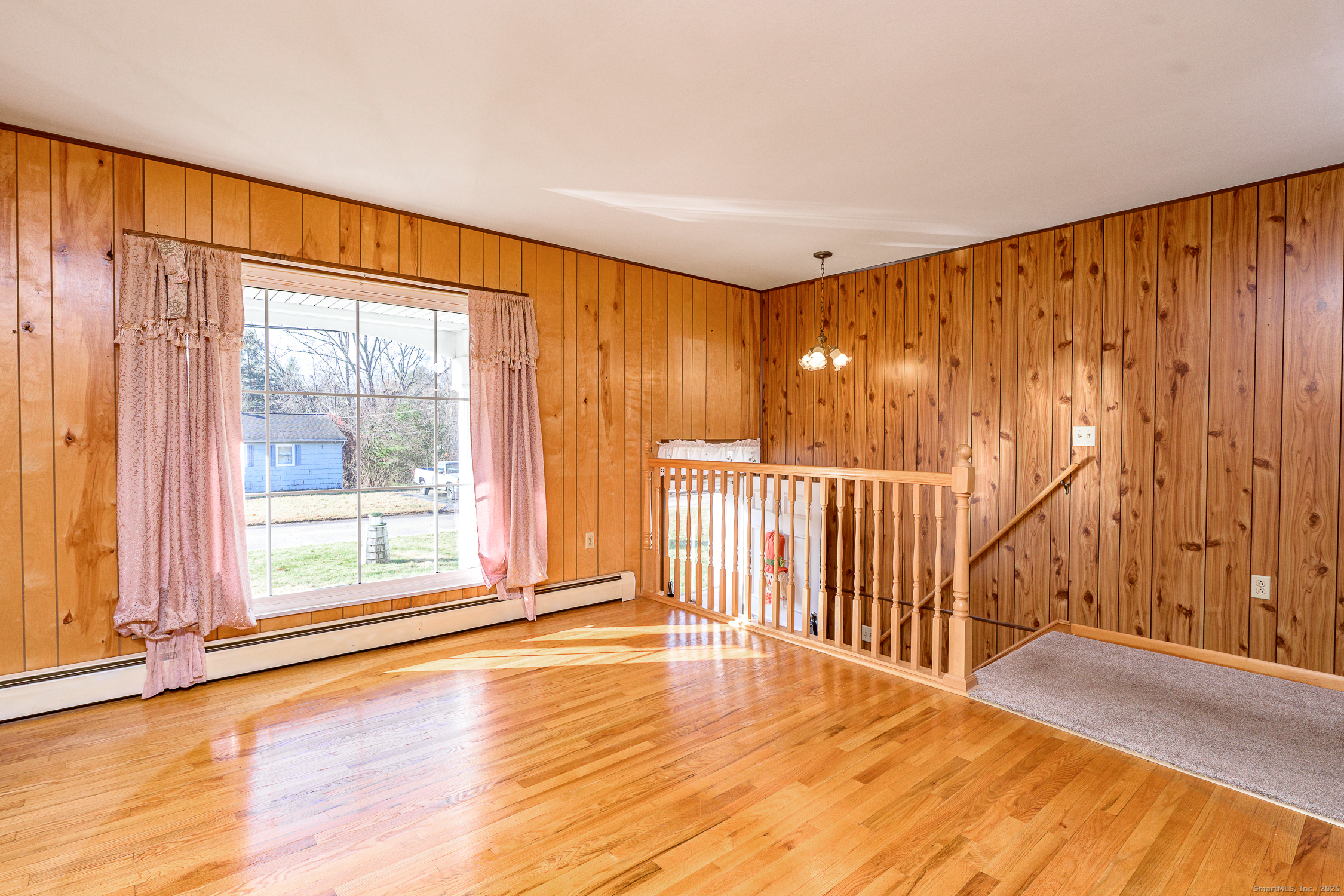 38 Toper Road Plainfield, CT 06374 - Photo 5 of 35 a view of a room with wooden floor and windows