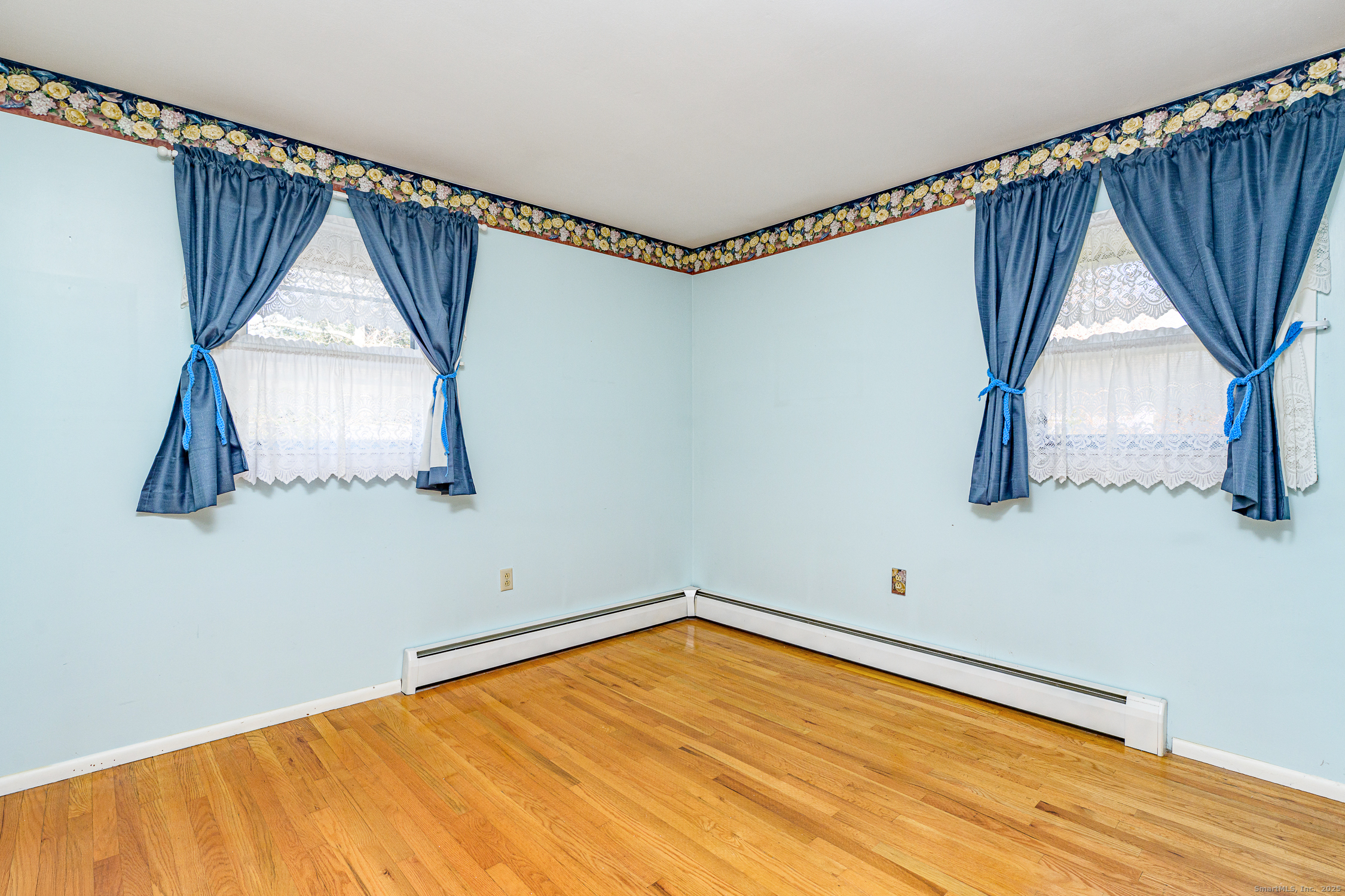 38 Toper Road Plainfield, CT 06374 - Photo 10 of 35 a view of a room with wooden floor and stairs
