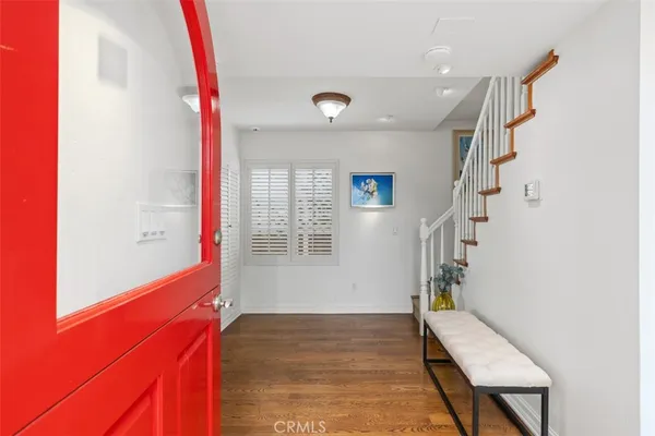 a living room with furniture and window