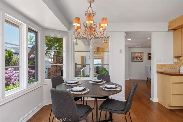 a kitchen with stainless steel appliances granite countertop a stove and a refrigerator