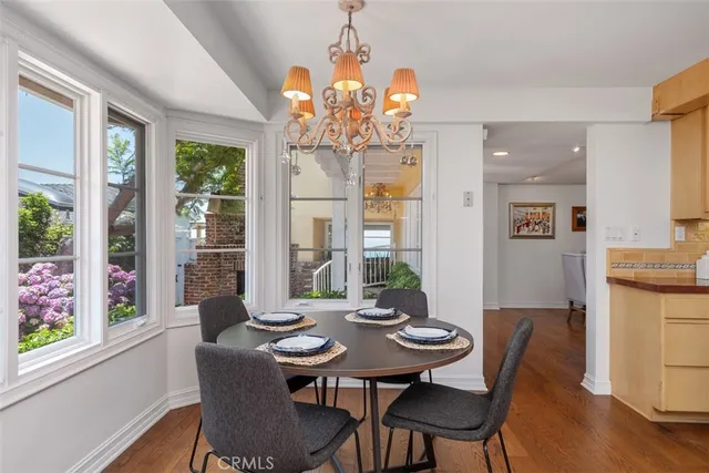 a kitchen with stainless steel appliances granite countertop a stove and a refrigerator