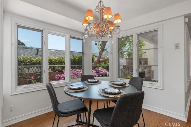 a living room with furniture or fireplace and a table