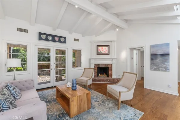 a bedroom with a large bed and furniture