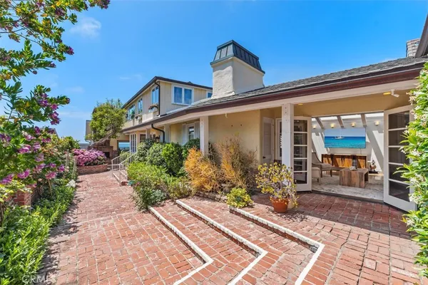 an aerial view of multiple houses with yard