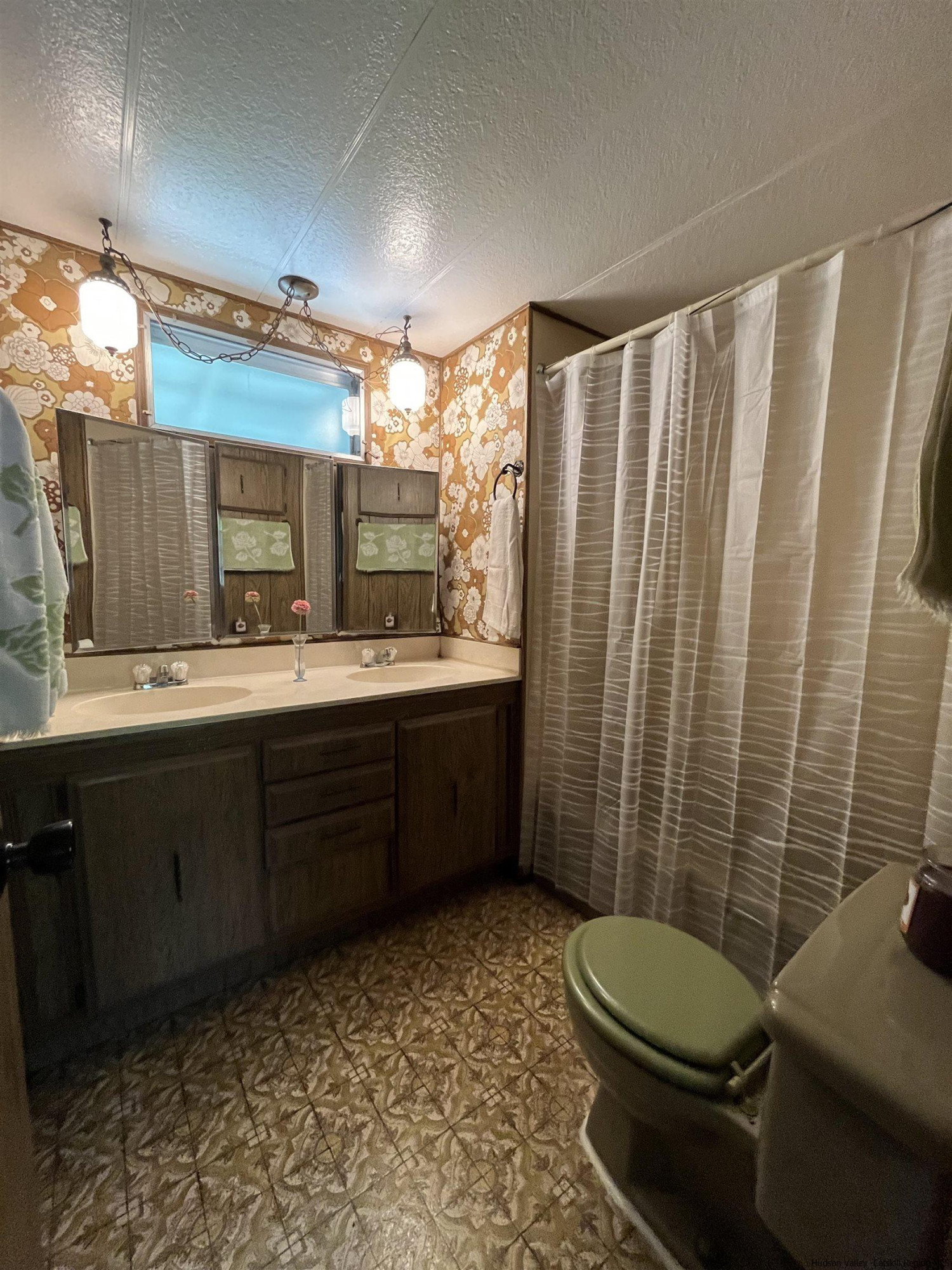 1882 High Falls Road Catskill, NY 12414 - Photo 12 of 18 a bathroom with a sink mirror vanity and toilet