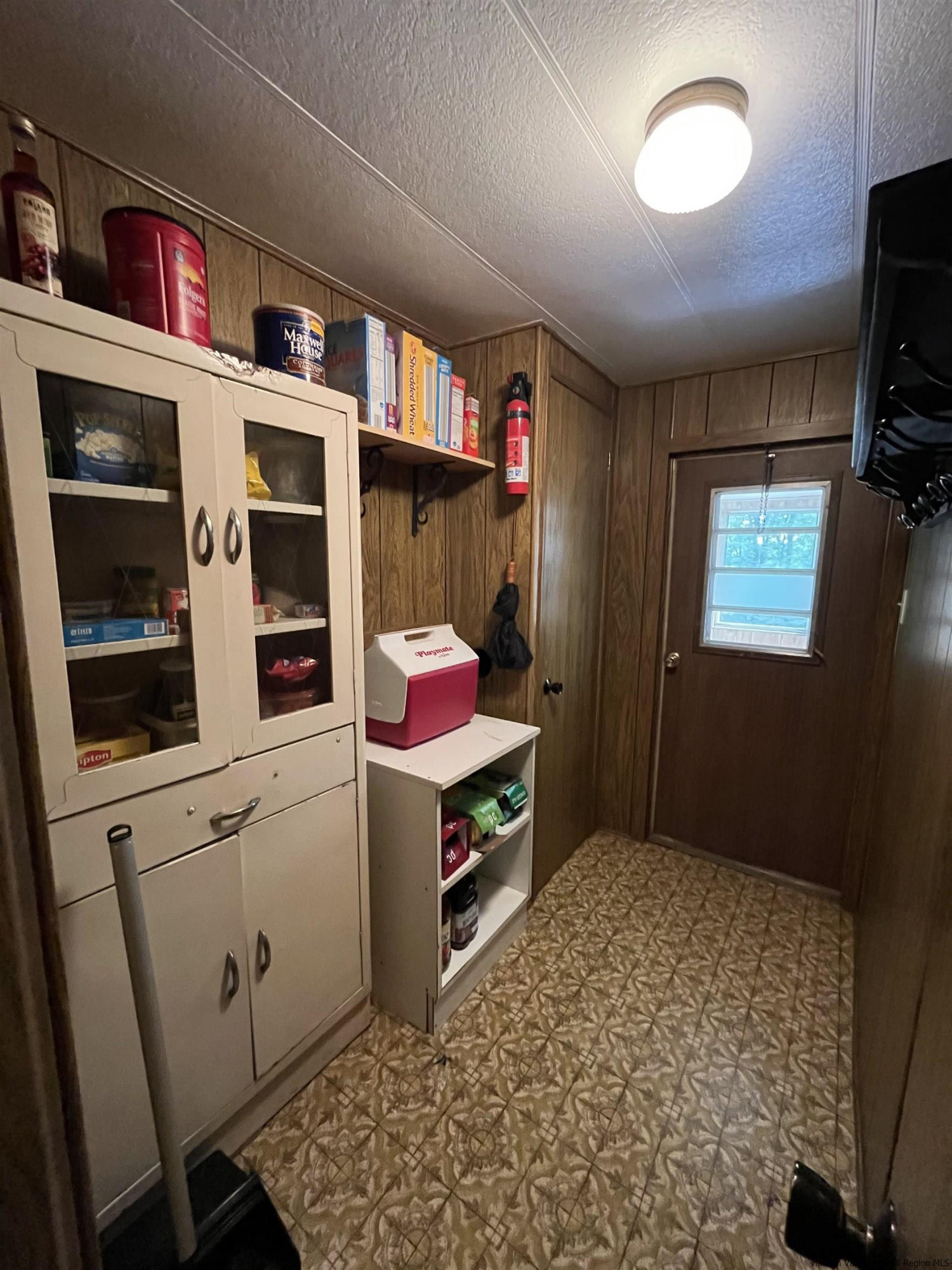 1882 High Falls Road Catskill, NY 12414 - Photo 15 of 18 a living room with furniture cabinets and flat screen tv