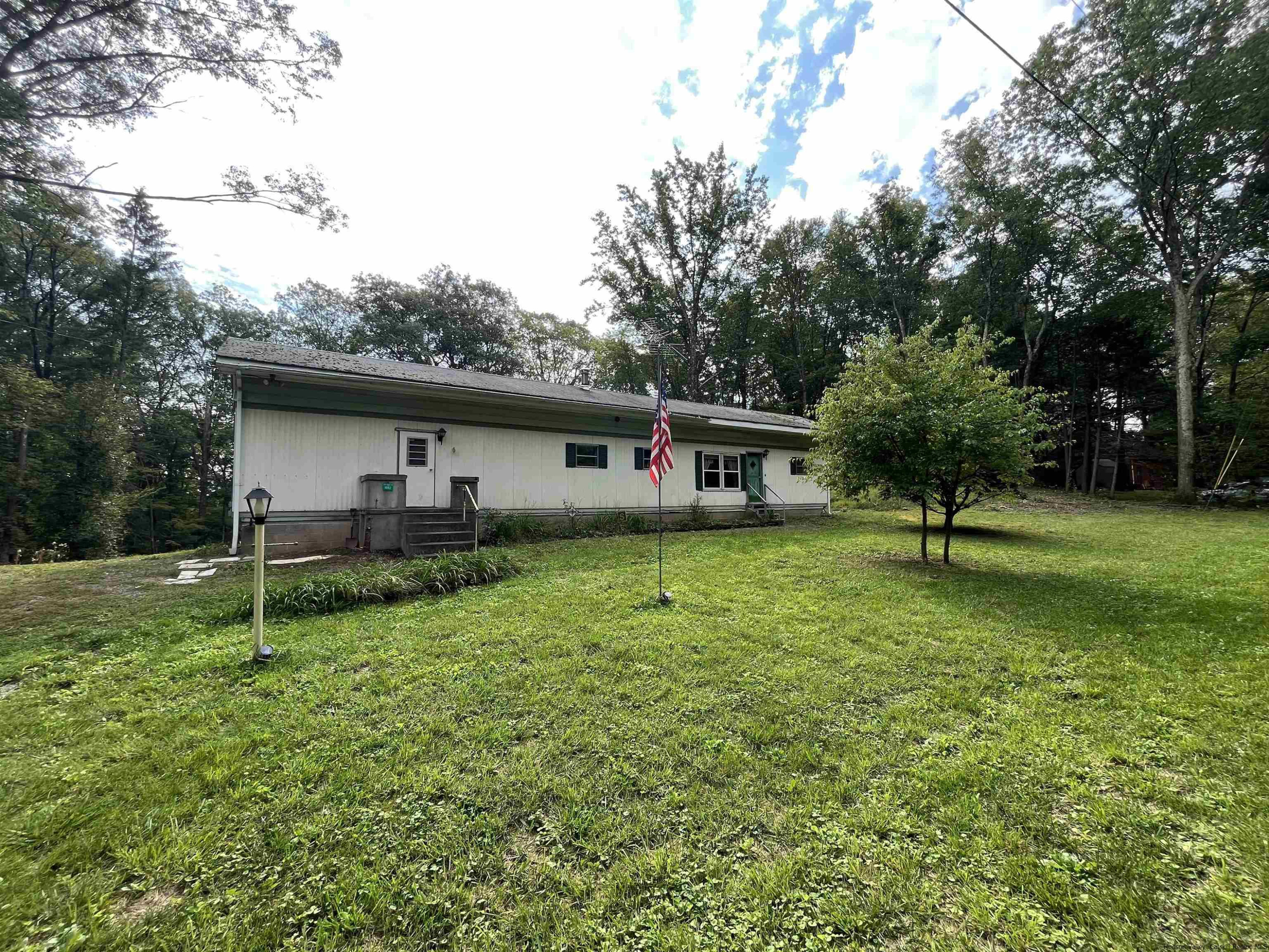1882 High Falls Road Catskill, NY 12414 - Photo 2 of 18 a view of a house with a backyard