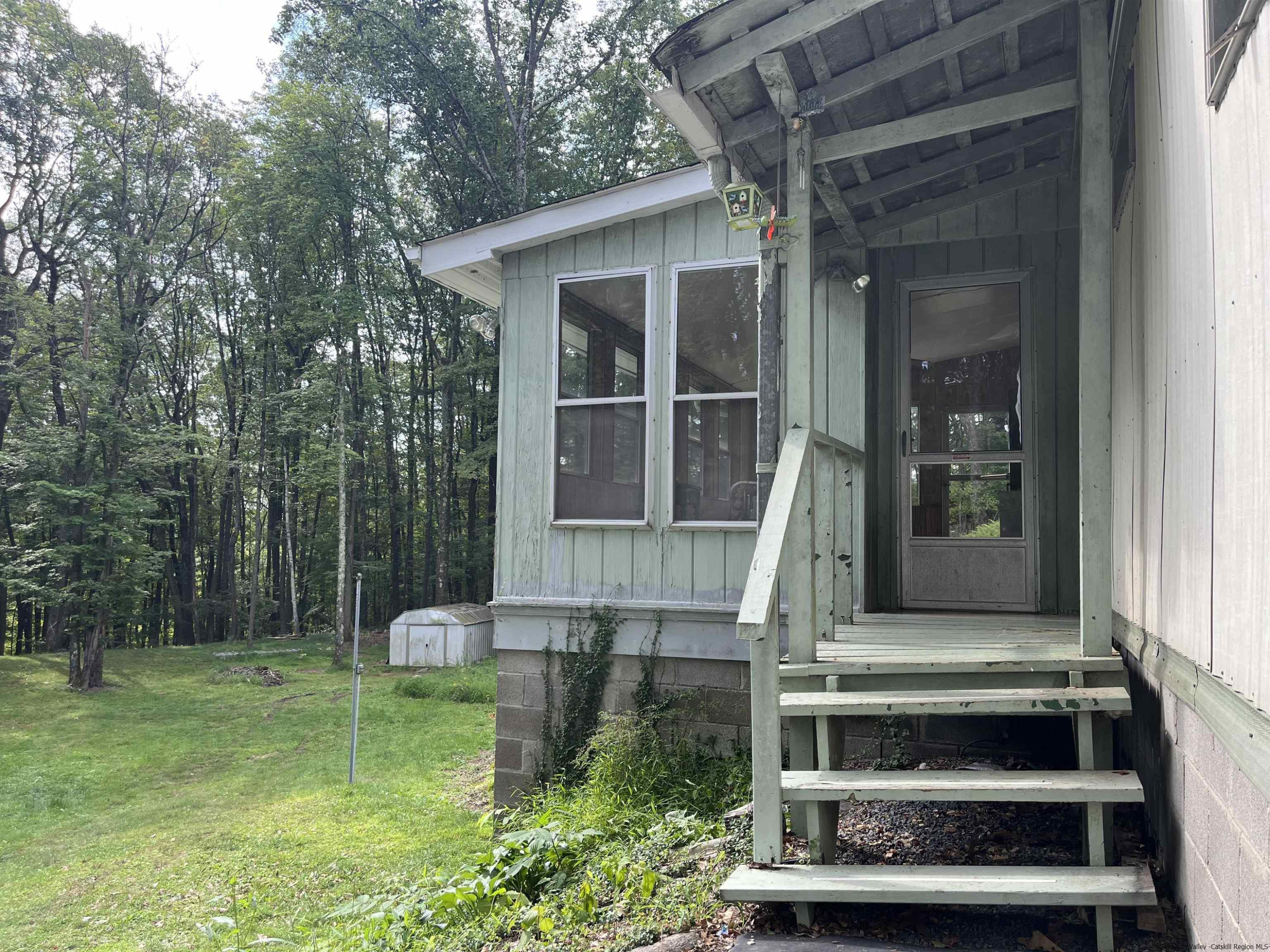 1882 High Falls Road Catskill, NY 12414 - Photo 5 of 18 a front view of a house with a yard