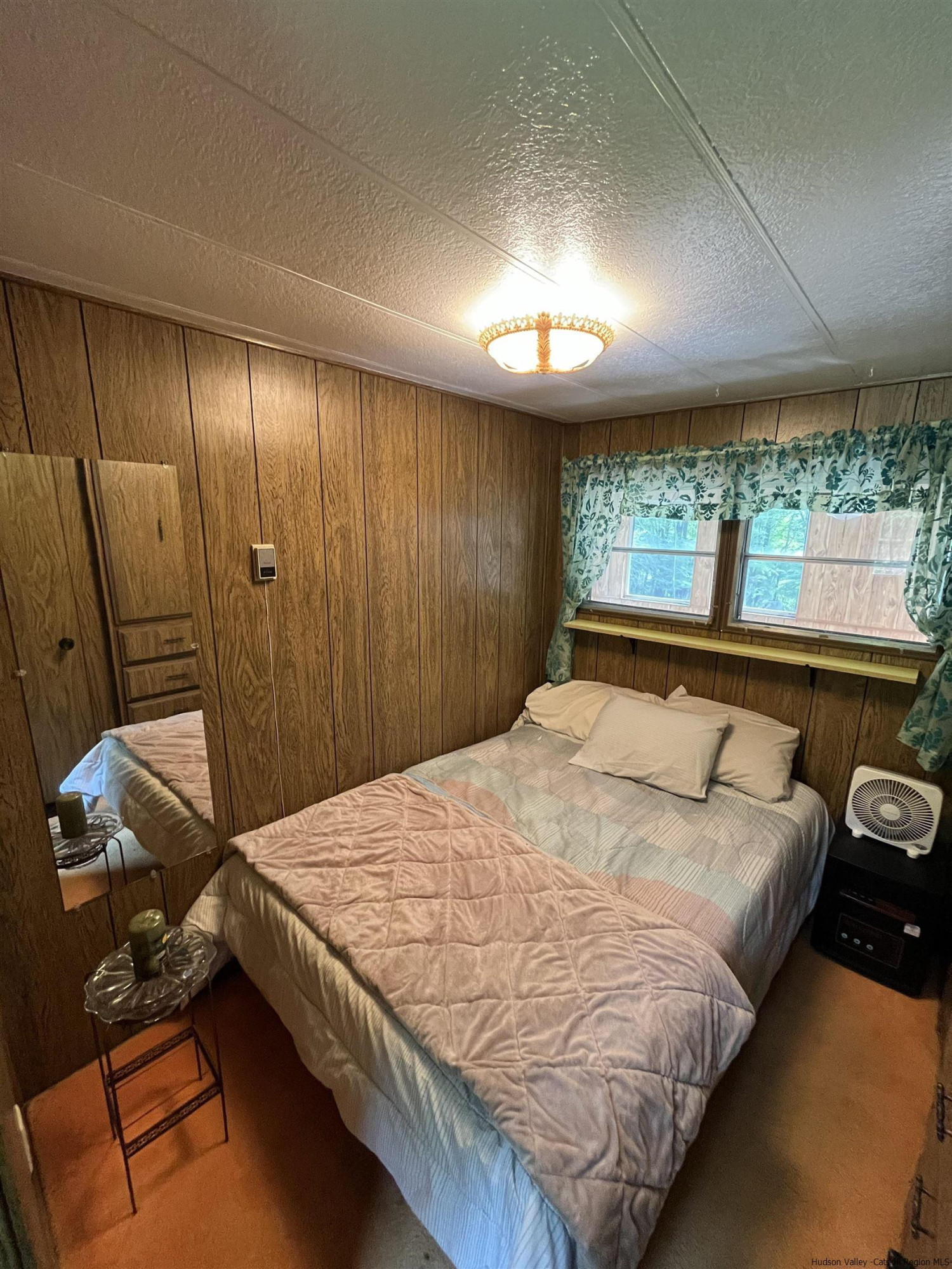 1882 High Falls Road Catskill, NY 12414 - Photo 10 of 18 a bedroom with a bed and large windows