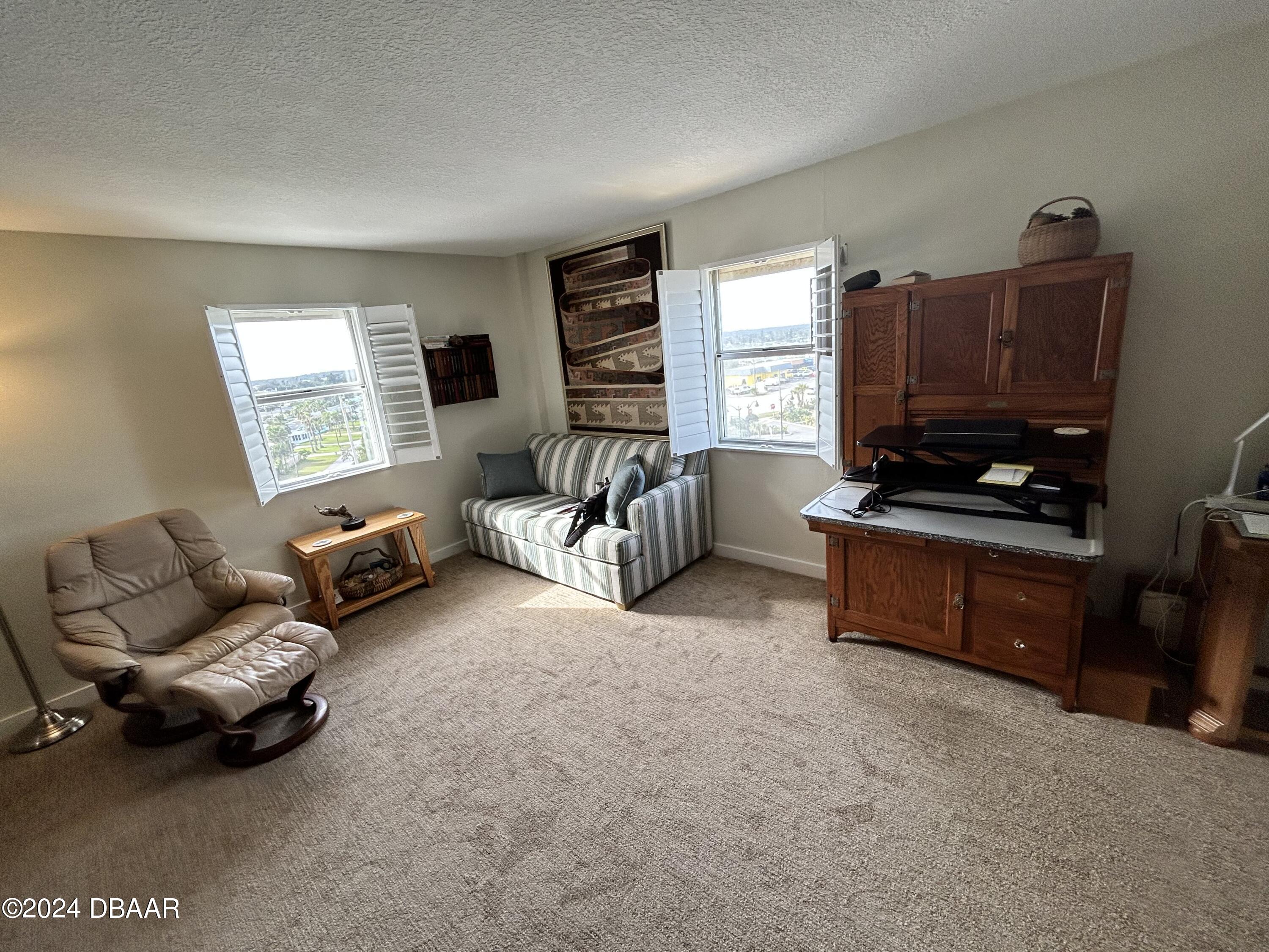 1051 Ocean Shore Boulevard, Unit 601 Ormond Beach, FL 32176 - Photo 9 of 11 Second Bedroom with Ensuite Bathroom