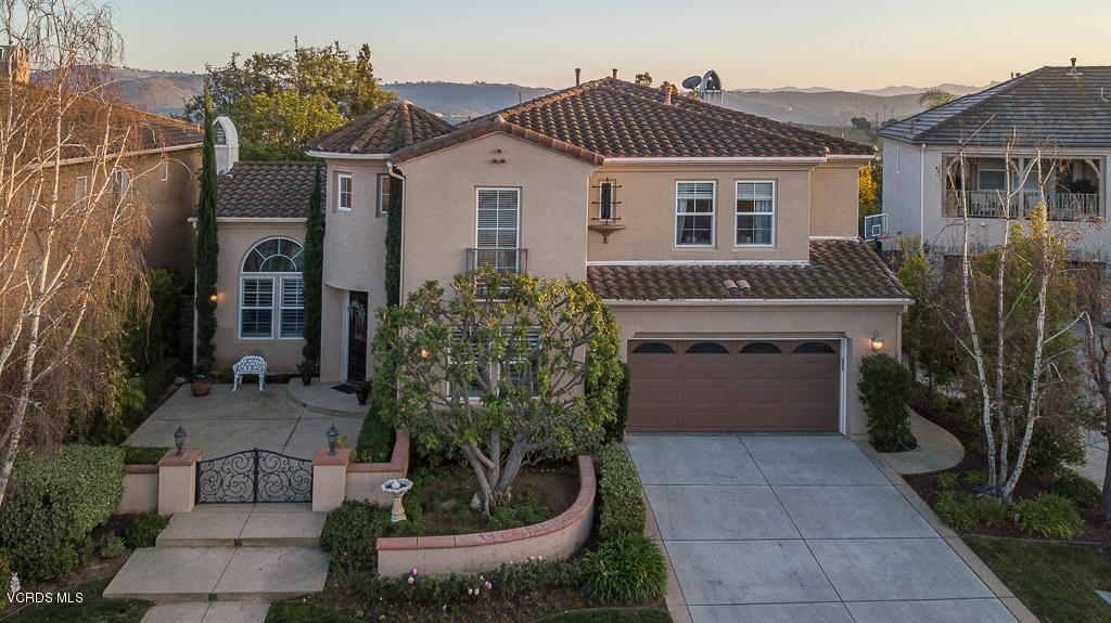 14176 Maya Circle Moorpark, CA 93021 - Photo 2 of 53 a front view of a house with garden
