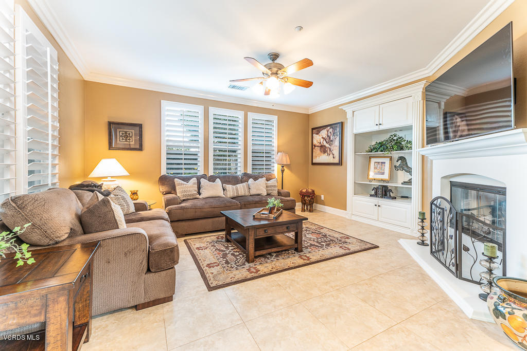 14176 Maya Circle Moorpark, CA 93021 - Photo 14 of 53 a living room with furniture and a fireplace