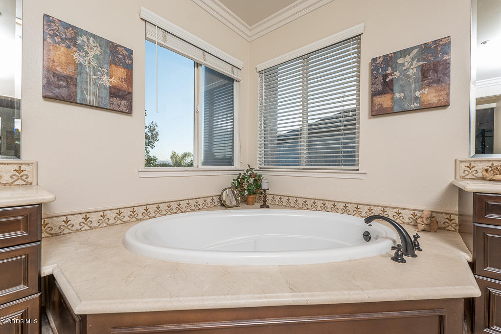 14176 Maya Circle Moorpark, CA 93021 - Photo 25 of 53 a white bath tub sitting next to a window