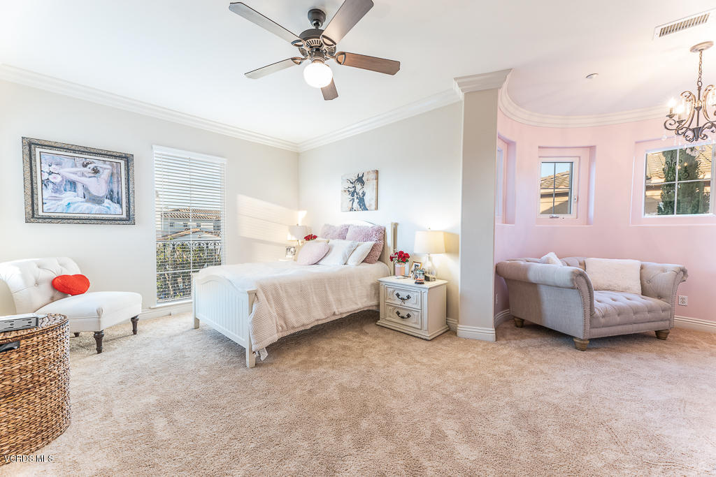 14176 Maya Circle Moorpark, CA 93021 - Photo 31 of 53 a bed room with a bed and a couch