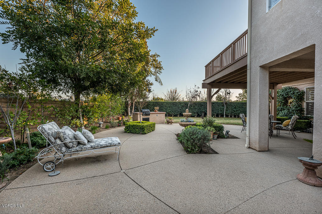 14176 Maya Circle Moorpark, CA 93021 - Photo 39 of 53 a view of a patio with couches and a table and chairs and potted plants