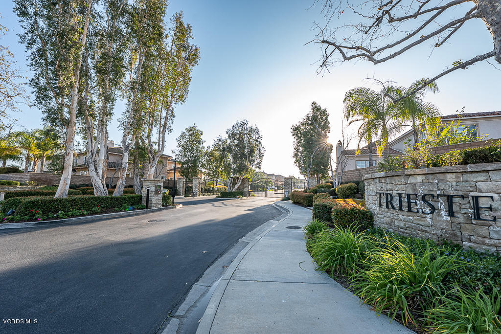 14176 Maya Circle Moorpark, CA 93021 - Photo 50 of 53 a view of a street with a bench and trees