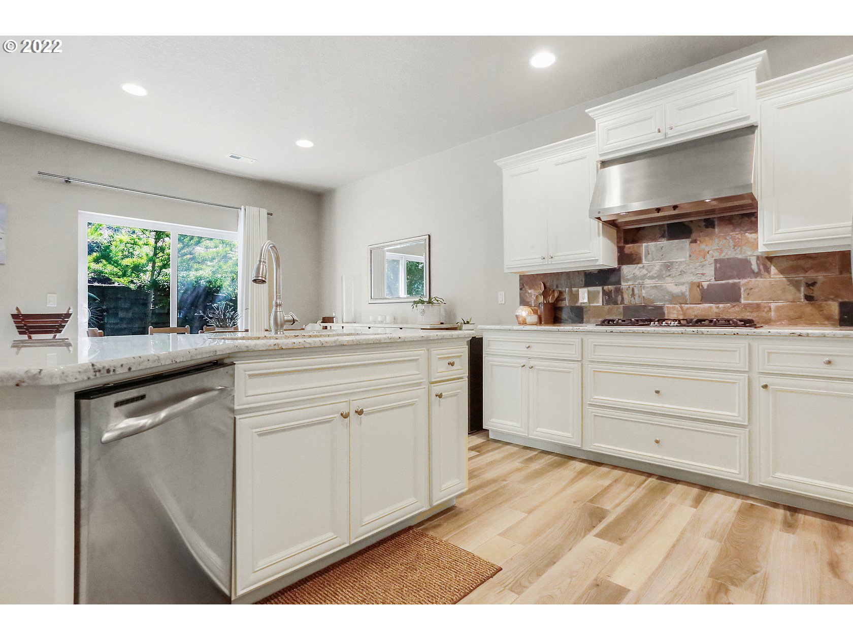 1773 Joseph Fields Street West Linn, OR 97068 - Photo 14 of 32 a kitchen with a sink stove and cabinets