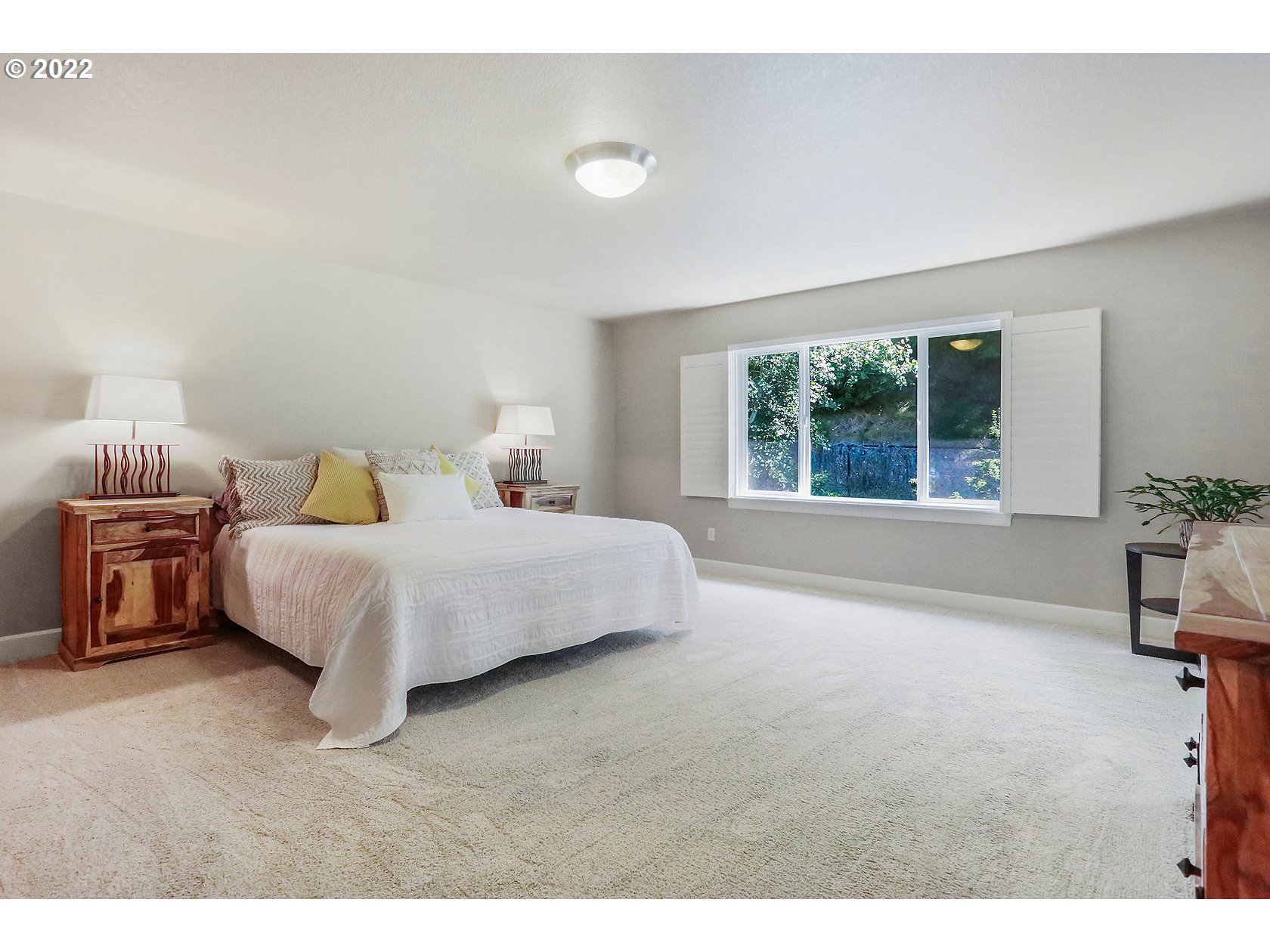 1773 Joseph Fields Street West Linn, OR 97068 - Photo 16 of 32 a bedroom with a bed and a window