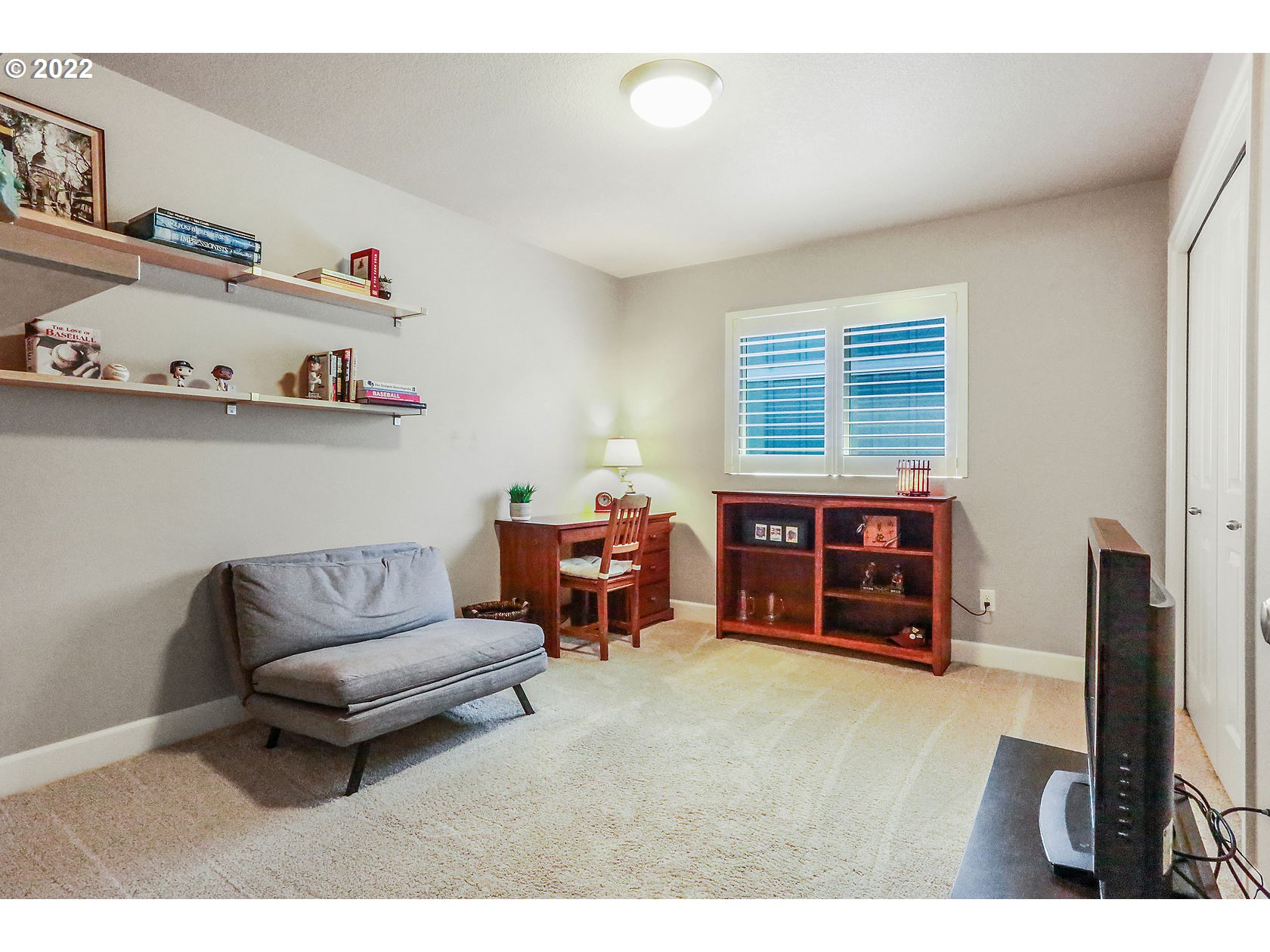 1773 Joseph Fields Street West Linn, OR 97068 - Photo 19 of 32 a living room with furniture and a flat screen tv