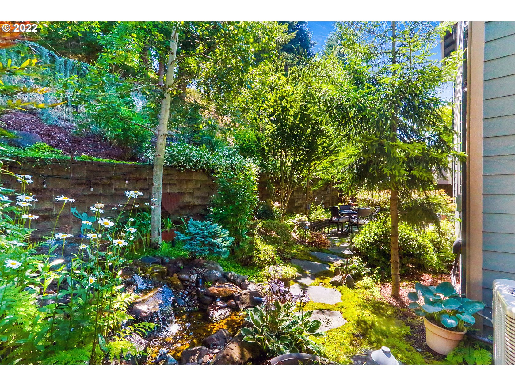 1773 Joseph Fields Street West Linn, OR 97068 - Photo 27 of 32 a backyard of a house with lots of green space