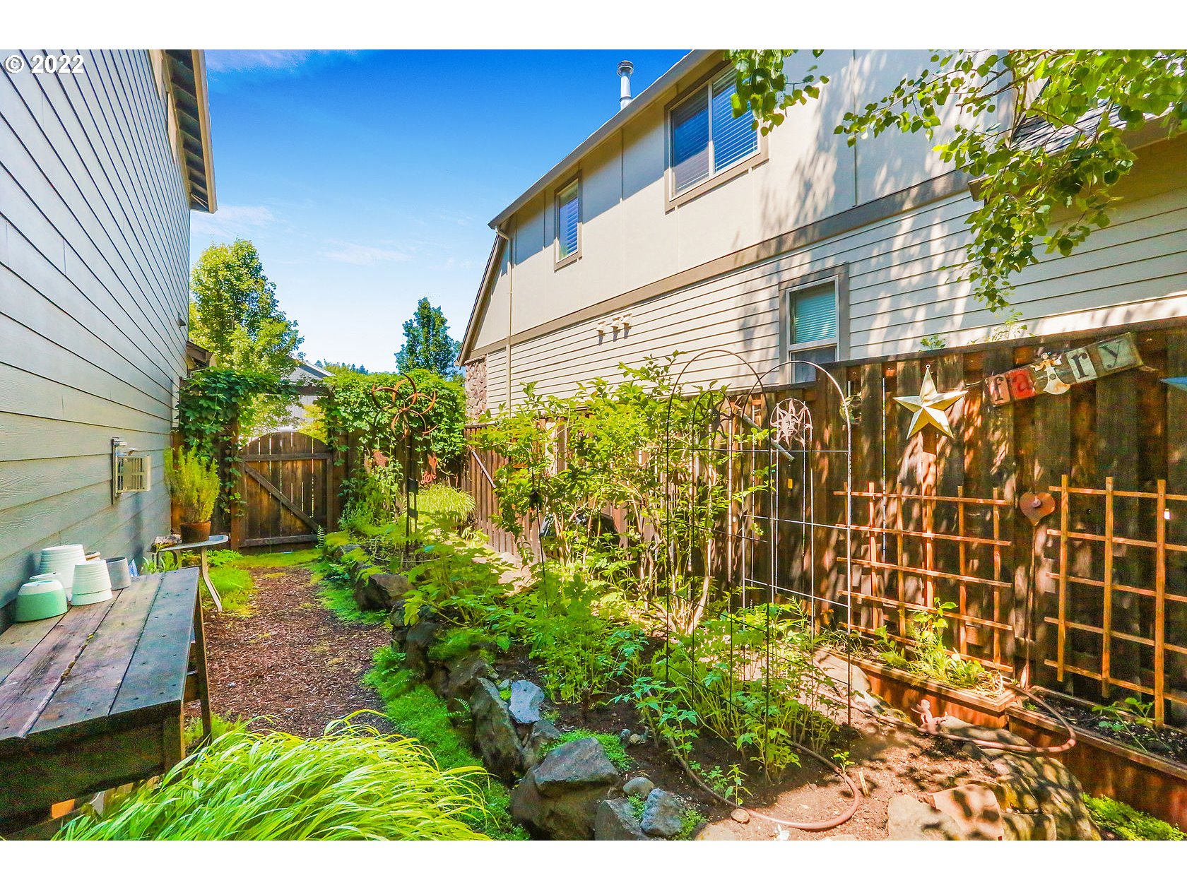 1773 Joseph Fields Street West Linn, OR 97068 - Photo 30 of 32 a view of a backyard with plants